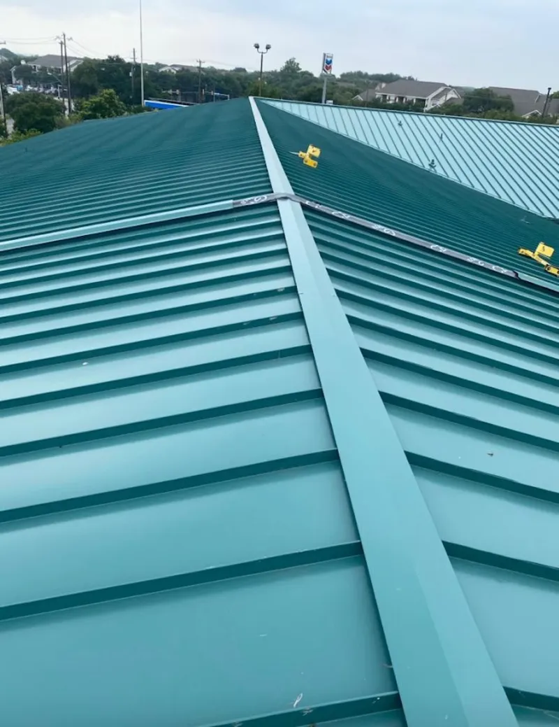 Green commercial metal roof ridge and valley for Metal Roof Repair in Attleboro