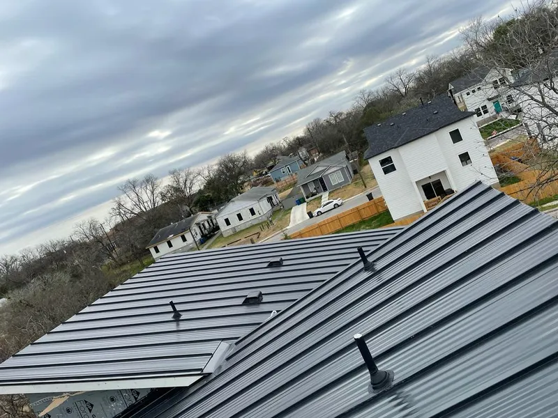Standing seam metal roof panels with vents for Skylight Repair in Attleboro